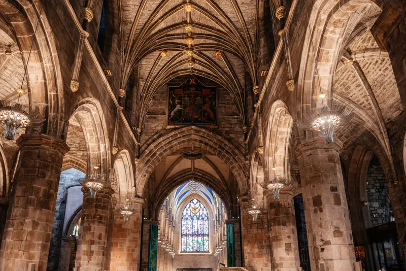 Gothic vaulted nave and stained glass inside St Giles' Cathedral, Edinburgh