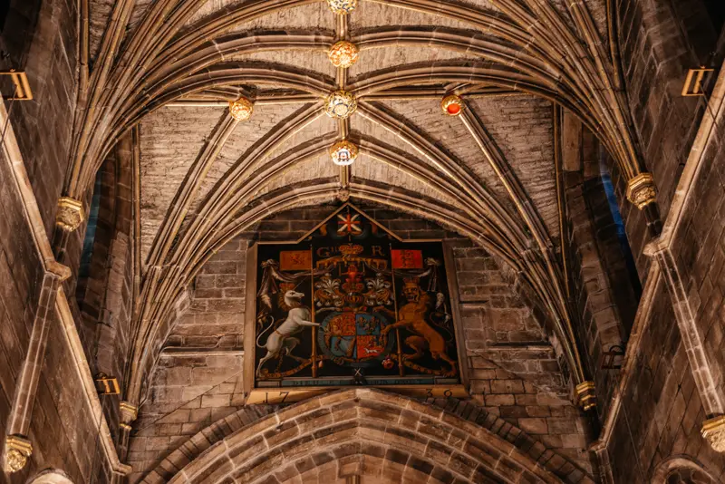Royal coat of arms set into the medieval stone ceiling of St Giles' Cathedral